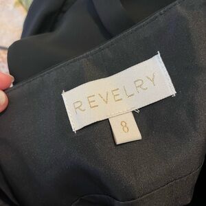 Is a maternity bride maid dress, black, and has been adjusted under the armpit.